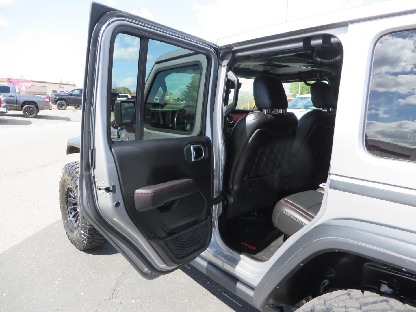 2021 SILVER /BLACK Jeep Wrangler Unlimited Rubicon (1C4HJXFG7MW) with an 3.6L V6 DOHC 24V FFV engine, 6A transmission, located at 2630 Grass Valley Highway, Auburn, CA, 95603, (530) 508-5100, 38.937893, -121.095482 - Features - Zone Offroad 3" Lift kit, Fox shocks, 37" Nitto Ridge Grappler tires, 17" Fuel Piston wheels, Warn winch, KC led lights, Voswitch switches, Teraflex HD tire relocation, Fire extinguisher, High Lift Jack, Shovel, Axe, Jumper Cables, and flat towable. - Photo#38